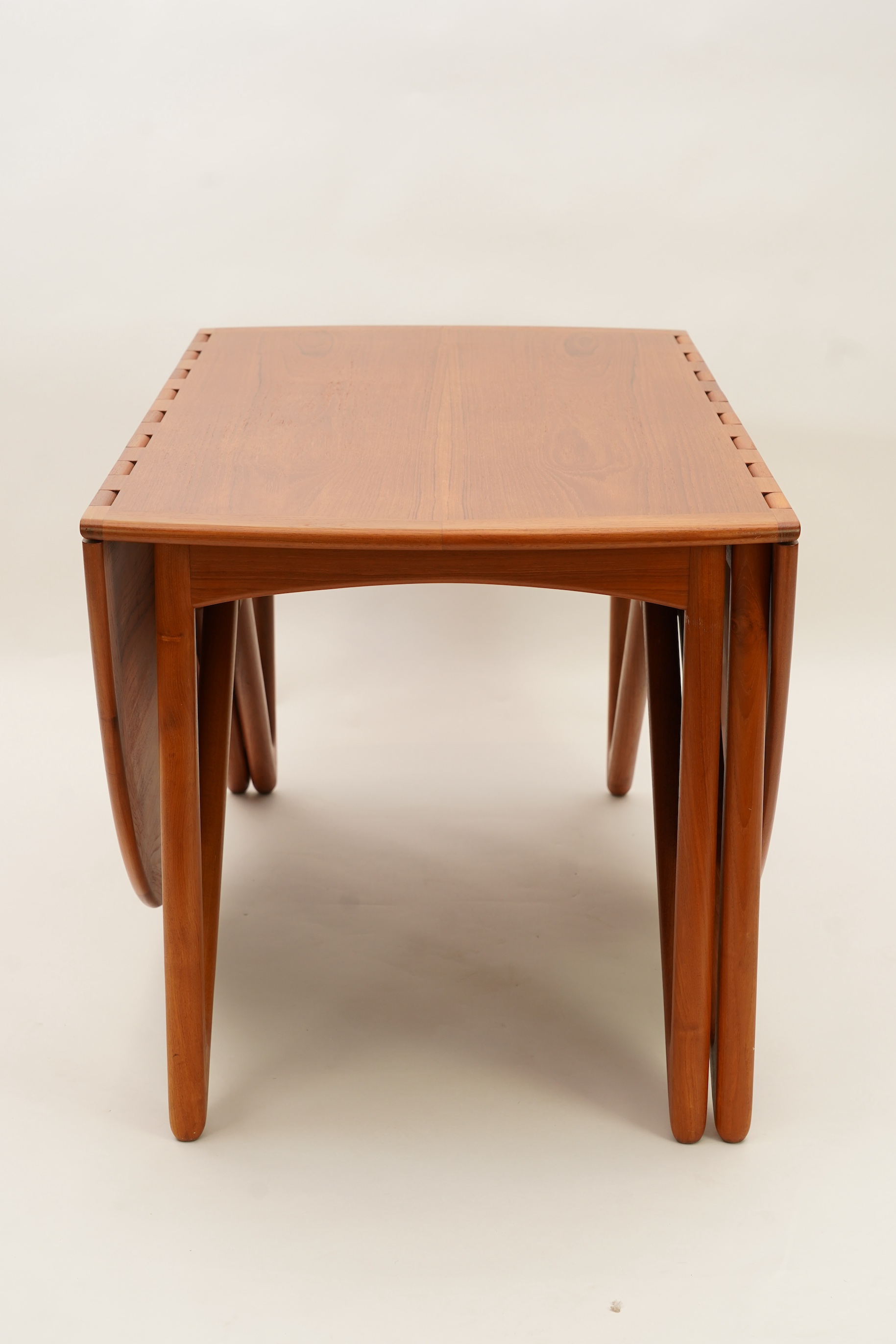 Niels Koefoed (Danish, b. 1929) for Koefoeds Møbelfabrik: A teak 'Oval Klap' dining table